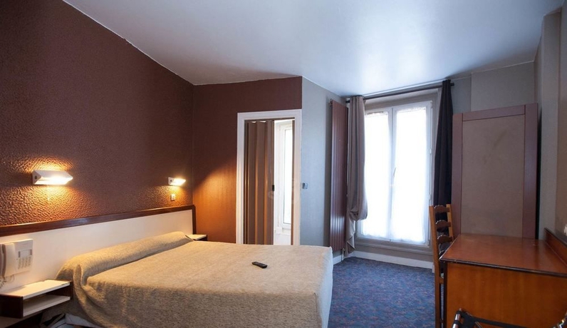 Imagen de la habitación del Hotel Grand De Paris. Foto 7