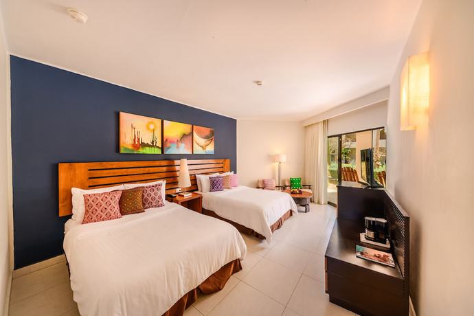 Imagen de la habitación del Hotel Grand Decameron Los Cabos, A Trademark All-Inclusive Resort. Foto 7