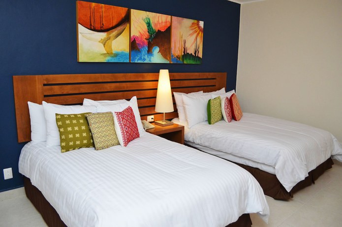 Imagen de la habitación del Hotel Grand Decameron Los Cabos, A Trademark All-Inclusive Resort. Foto 14