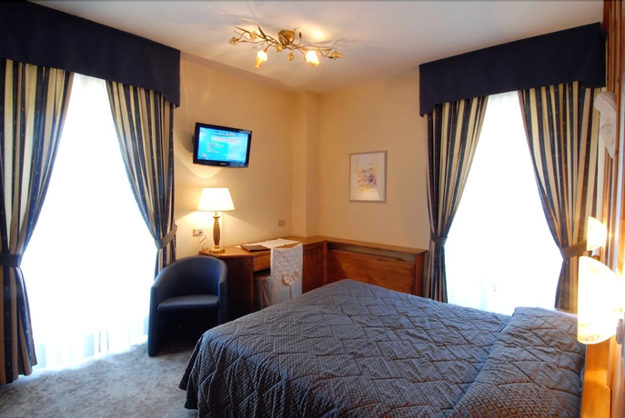 Imagen de la habitación del Hotel Grand Des Alpes, San Martino di Castrozza. Foto 2