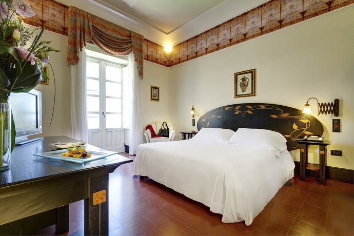 Imagen de la habitación del Hotel Grand Des Ètrangers. Foto 10