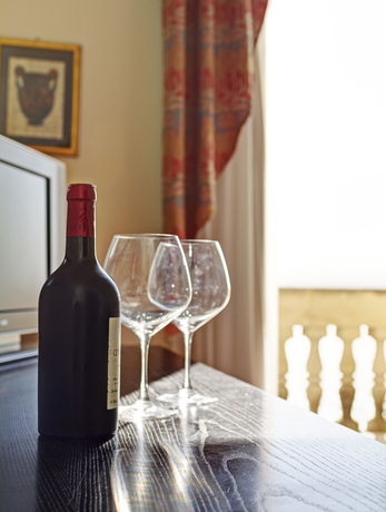 Imagen de la habitación del Hotel Grand Des Ètrangers. Foto 11