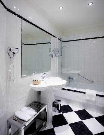 Imagen de la habitación del Hotel Grand Des Terreaux. Foto 4