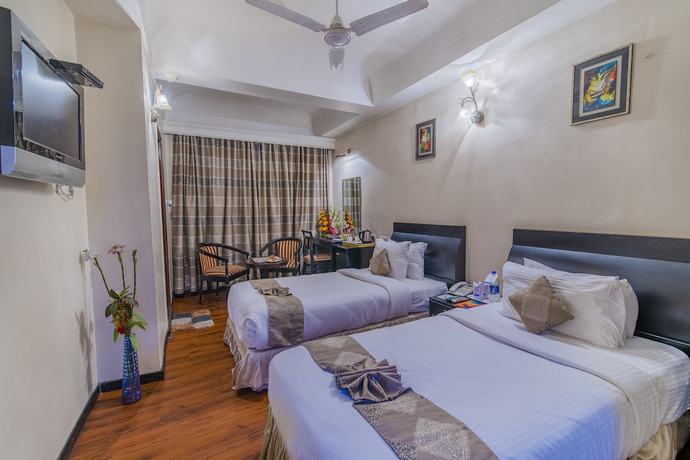 Imagen de la habitación del Hotel Grand Dhillon. Foto 3