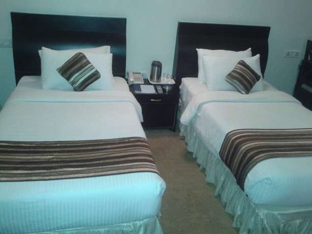 Imagen de la habitación del Hotel Grand Dhillon. Foto 13