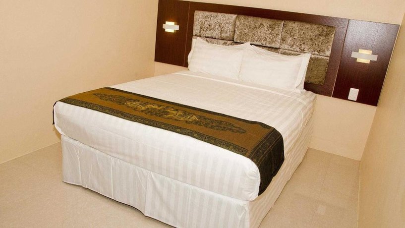 Imagen de la habitación del Hotel Grand Diamond Suites Trinidad. Foto 13