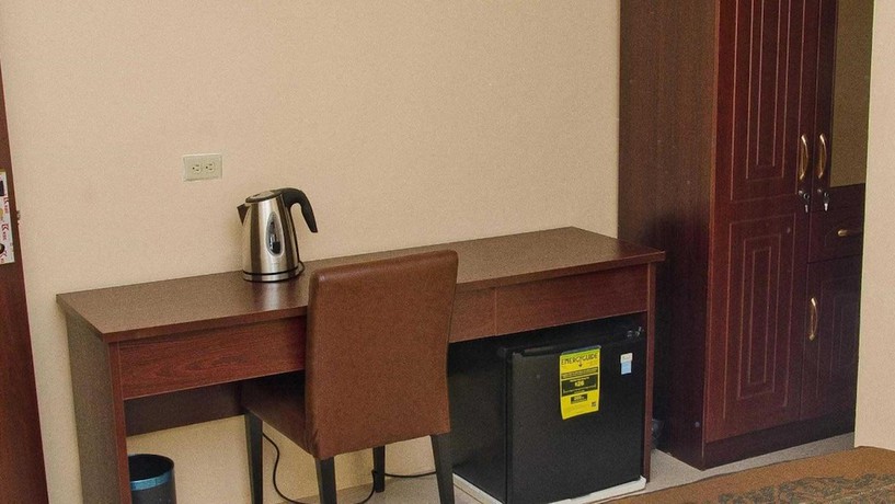 Imagen de la habitación del Hotel Grand Diamond Suites Trinidad. Foto 15