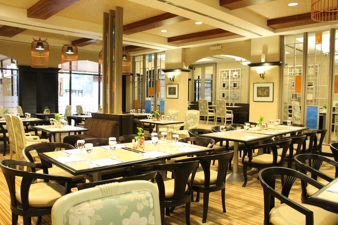 Imagen del bar/restaurante del Hotel Grand Diamond Yogyakarta. Foto 2