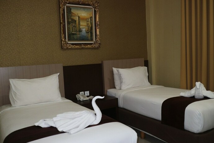 Imagen de la habitación del Hotel Grand Dian Boutique. Foto 13