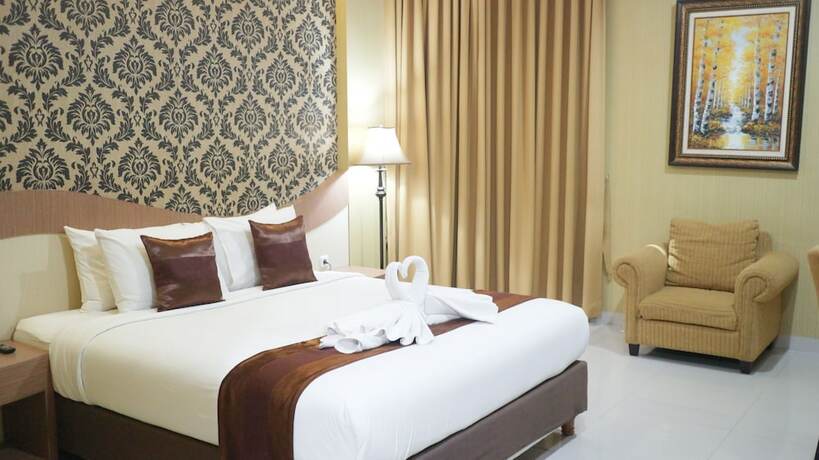Imagen de la habitación del Hotel Grand Dian Boutique. Foto 14