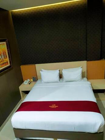 Imagen de la habitación del Hotel Grand Dian Boutique. Foto 15