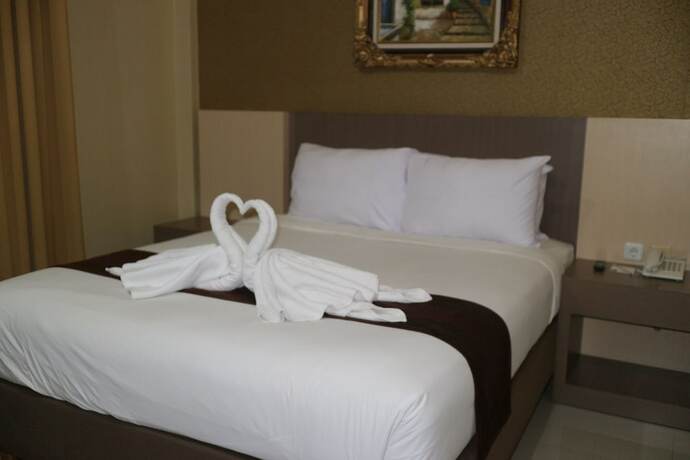 Imagen de la habitación del Hotel Grand Dian Boutique. Foto 17