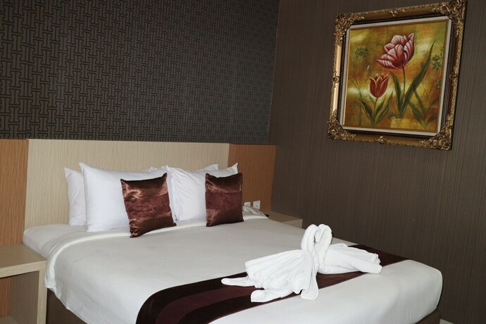 Imagen de la habitación del Hotel Grand Dian Boutique. Foto 19
