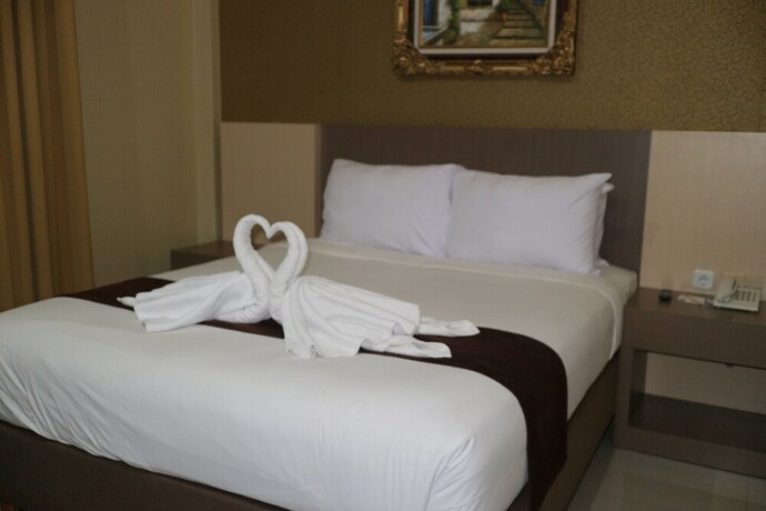 Imagen de la habitación del Hotel Grand Dian Boutique. Foto 20