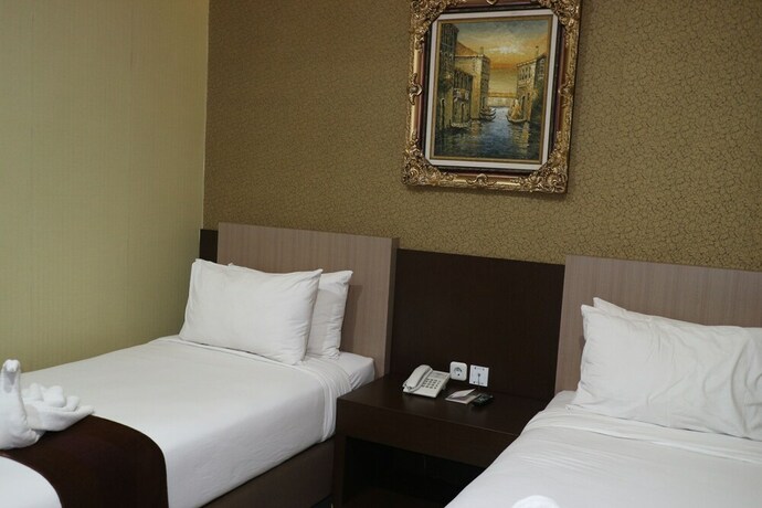 Imagen de la habitación del Hotel Grand Dian Boutique. Foto 24