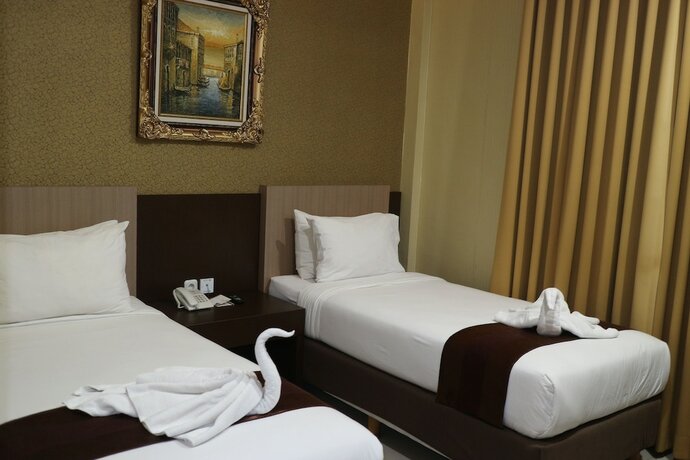 Imagen de la habitación del Hotel Grand Dian Boutique. Foto 29