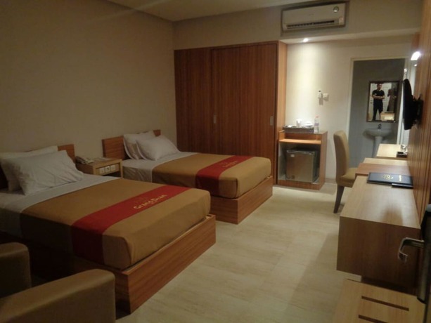 Imagen de la habitación del Hotel Grand Dian Slawi. Foto 18