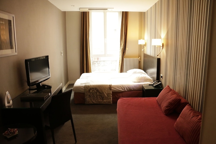 Imagen de la habitación del Hotel Grand D'orléans, Toulouse. Foto 4