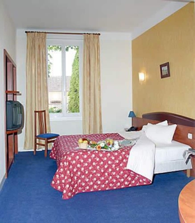 Imagen de la habitación del Hotel Grand D'orleans, Albi. Foto 4