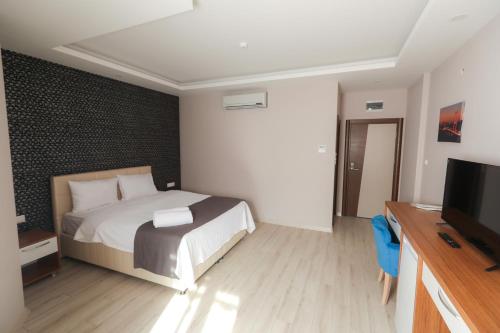 Imagen de la habitación del Hotel Grand Dost. Foto 7
