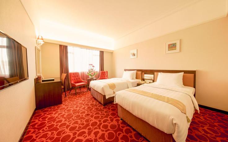 Imagen de la habitación del Hotel Grand Dragon. Foto 2