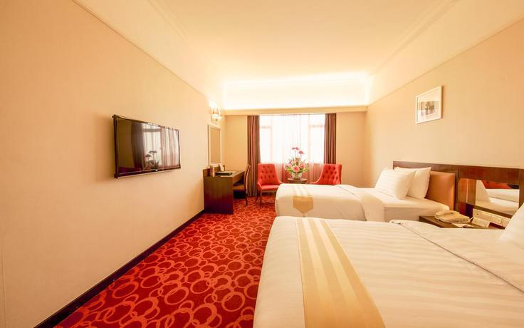 Imagen de la habitación del Hotel Grand Dragon. Foto 4