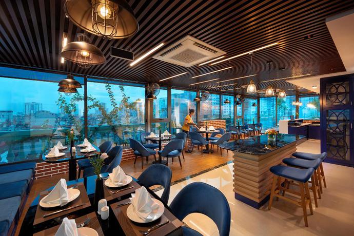 Imagen del bar/restaurante del Hotel Grand Dragon Hanoi. Foto 2