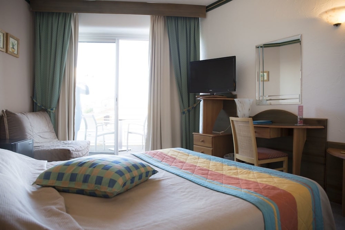 Imagen de la habitación del Hotel Grand Du Lido. Foto 12