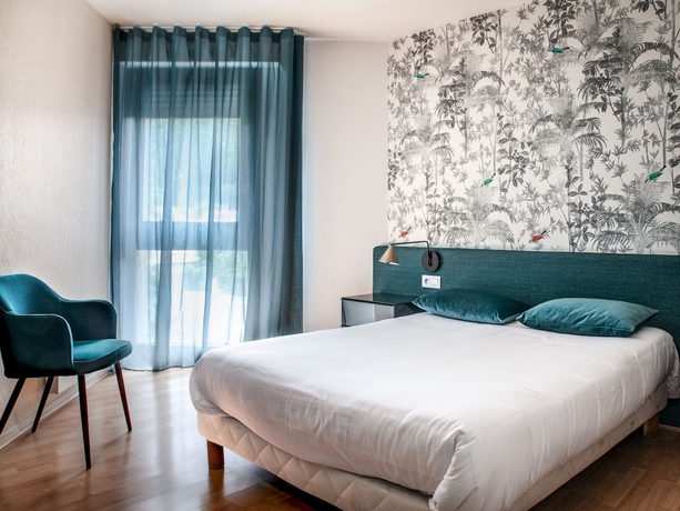 Imagen de la habitación del Hotel Grand Du Parc, Florac. Foto 3