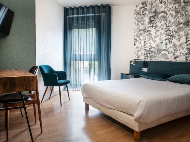 Imagen de la habitación del Hotel Grand Du Parc, Florac. Foto 6
