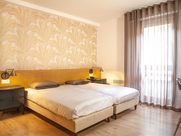 Imagen de la habitación del Hotel Grand Du Parc, Florac. Foto 10