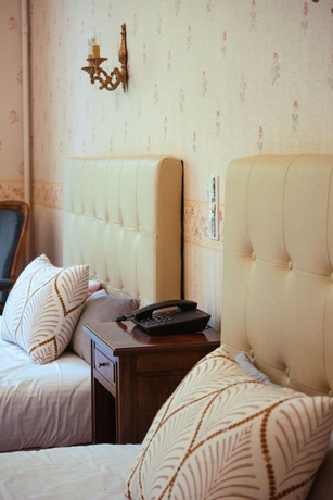 Imagen de la habitación del Hotel Grand Du Parc, Florac. Foto 16