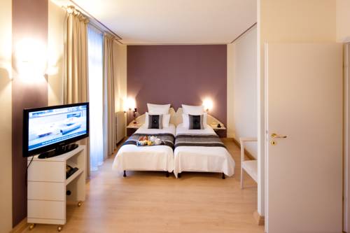 Imagen de la habitación del Hotel Grand Du Tonneau D'or. Foto 3