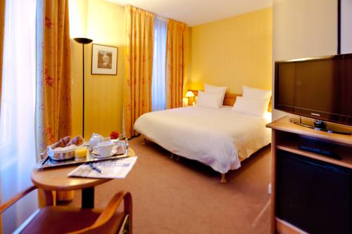 Imagen de la habitación del Hotel Grand Du Tonneau D'or. Foto 6