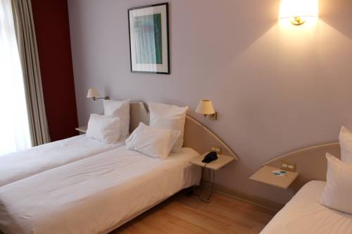 Imagen de la habitación del Hotel Grand Du Tonneau D'or. Foto 8