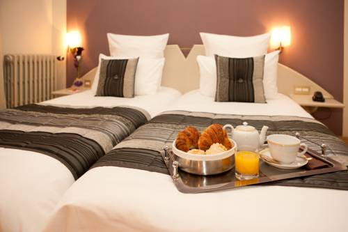 Imagen de la habitación del Hotel Grand Du Tonneau D'or. Foto 10