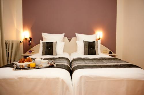 Imagen de la habitación del Hotel Grand Du Tonneau D'or. Foto 11