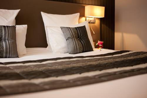 Imagen de la habitación del Hotel Grand Du Tonneau D'or. Foto 12