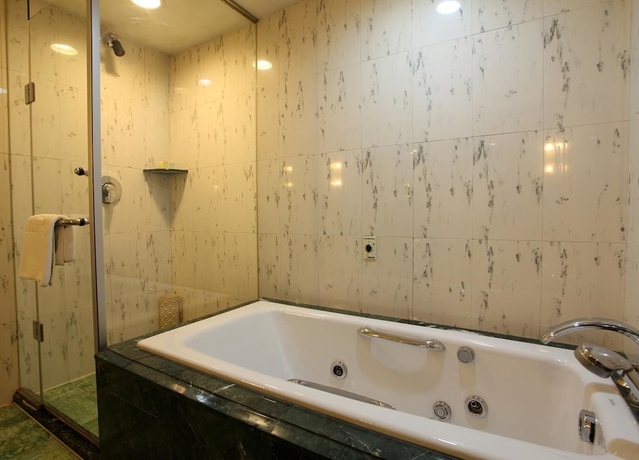 Imagen de la habitación del Hotel Grand Dynasty - Beijing. Foto 2