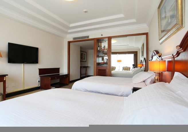 Imagen de la habitación del Hotel Grand Dynasty - Beijing. Foto 3
