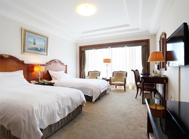 Imagen de la habitación del Hotel Grand Dynasty - Beijing. Foto 6