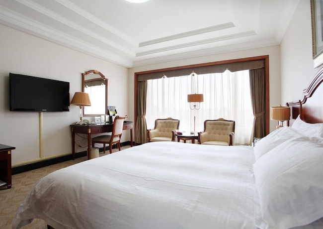 Imagen de la habitación del Hotel Grand Dynasty - Beijing. Foto 10