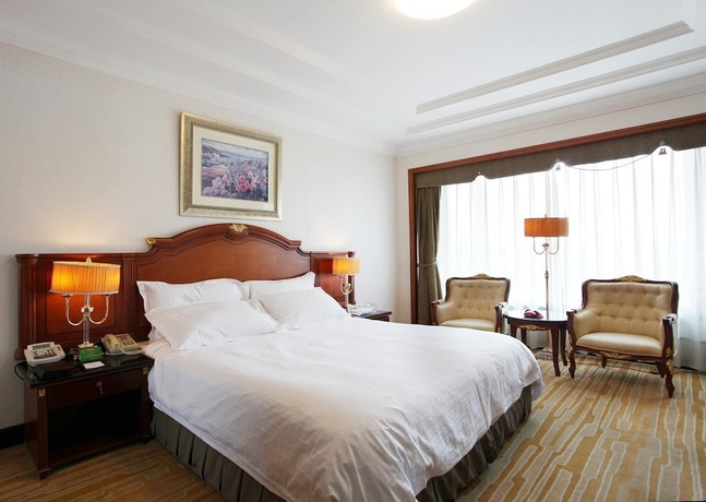 Imagen de la habitación del Hotel Grand Dynasty - Beijing. Foto 11