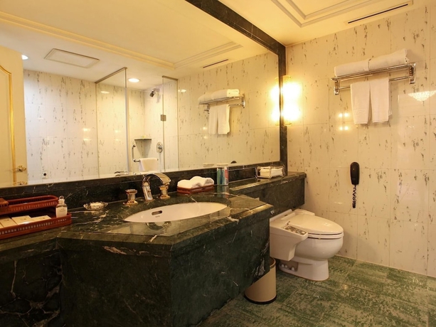 Imagen de la habitación del Hotel Grand Dynasty - Beijing. Foto 13