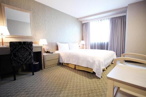 Imagen de la habitación del Hotel Grand Earl. Foto 8