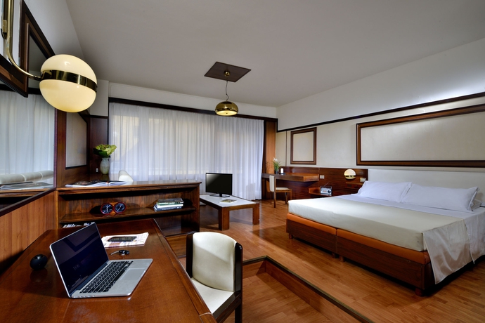 Imagen de la habitación del Hotel Grand Elite. Foto 11