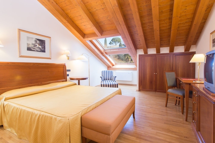 Imagen de la habitación del Hotel Grand Entourage Palazzo Strassoldo. Foto 11