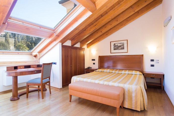 Imagen de la habitación del Hotel Grand Entourage Palazzo Strassoldo. Foto 12