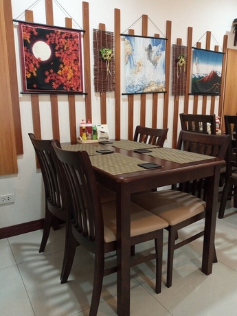 Imagen del bar/restaurante del Hotel Grand Esie Service Apartment. Foto 3