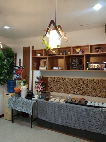 Imagen del bar/restaurante del Hotel Grand Esie Service Apartment. Foto 4